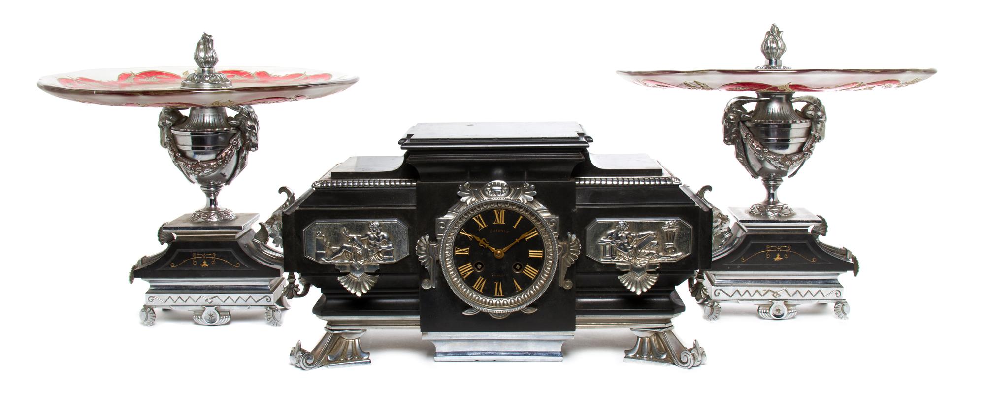 A French Silvered Metal and Slate Clock Garniture, Frigout, Height of tazza 12 3/4 inches.