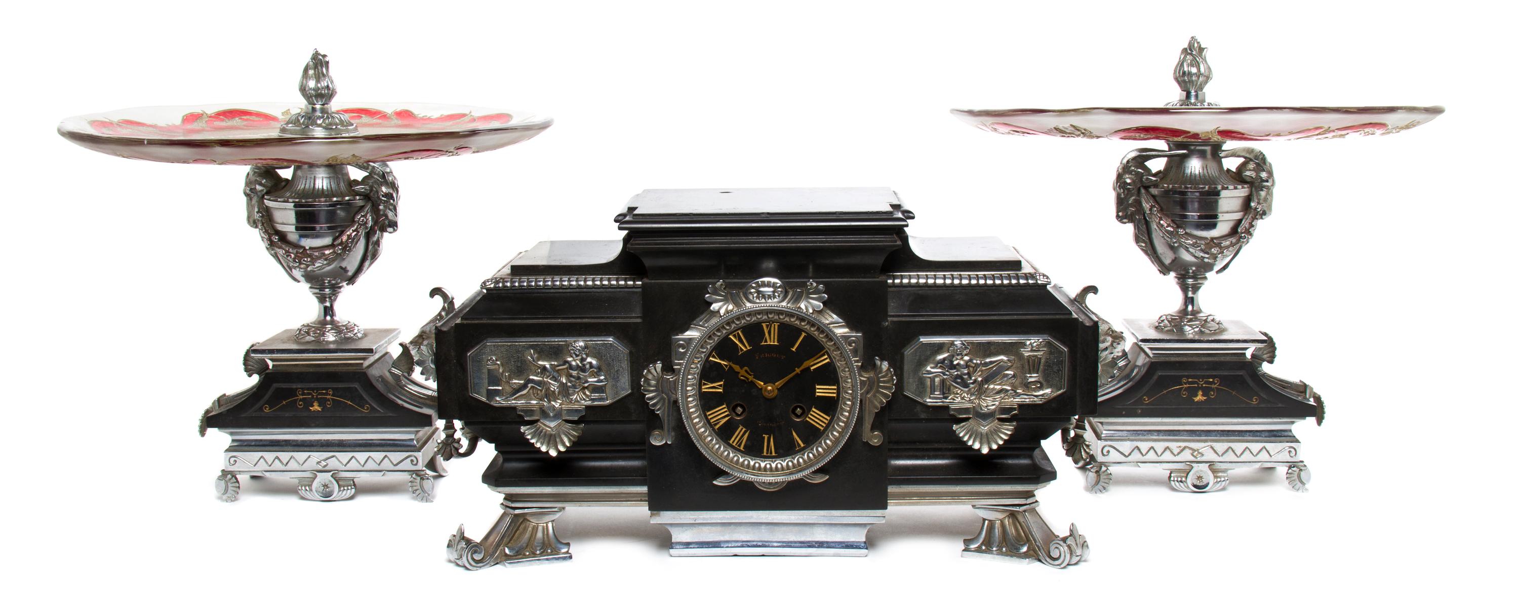 A French Silvered Metal and Slate Clock Garniture, Frigout, Height of tazza 12 3/4 inches.