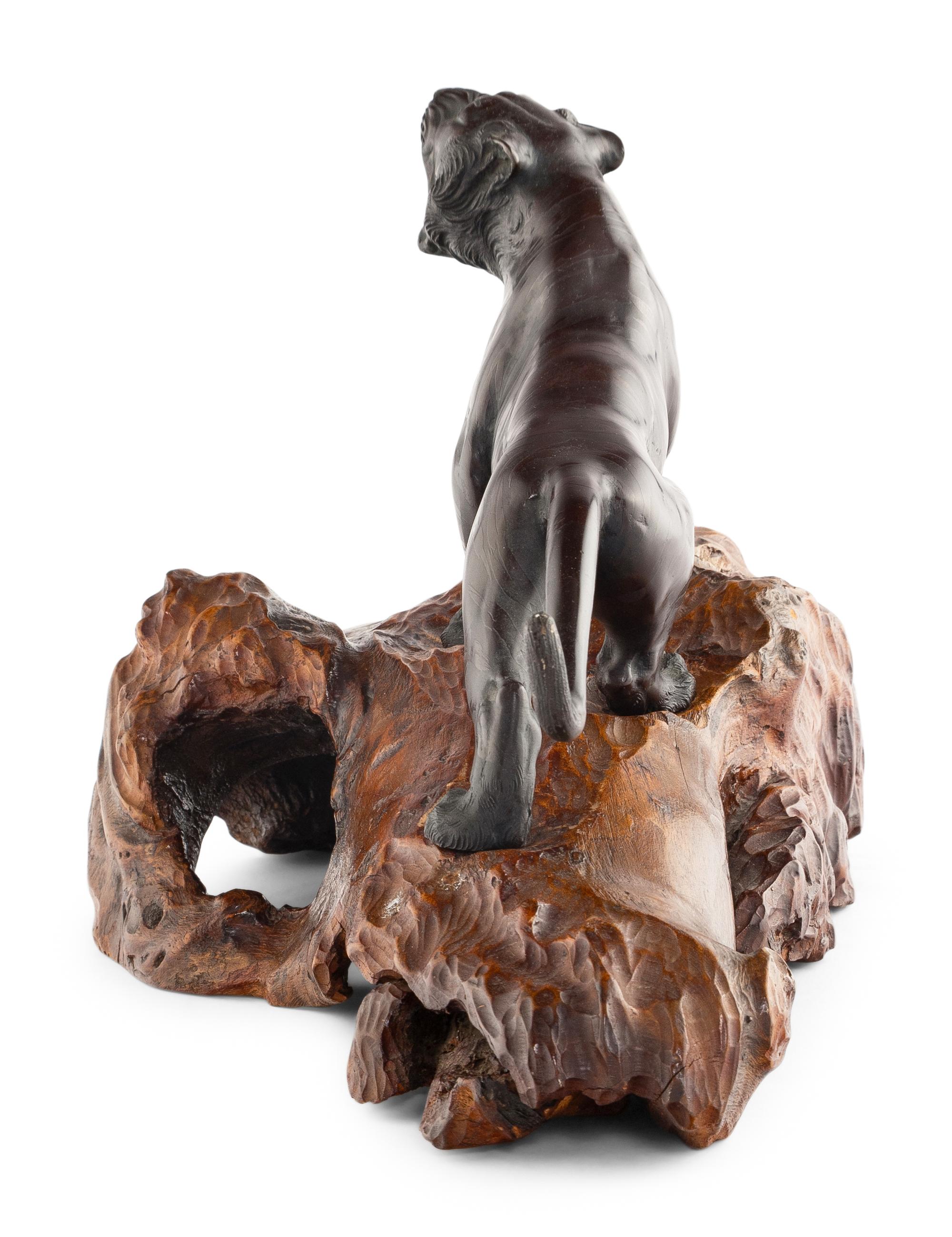 A Japanese Bronze Okimono of a Tiger