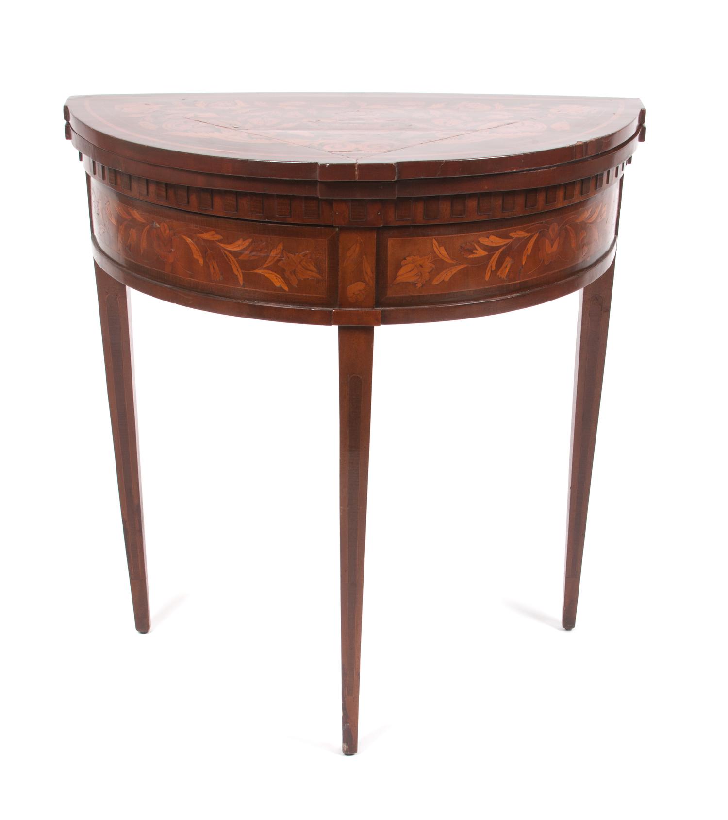 A Regency Mahogany and Marquetry Flip-Top Tea Table Height 30 x width 28 1/2 x depth 14 1/4 inches.