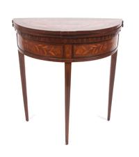 A Regency Mahogany and Marquetry Flip-Top Tea Table Height 30 x width 28 1/2 x depth 14 1/4 inches.