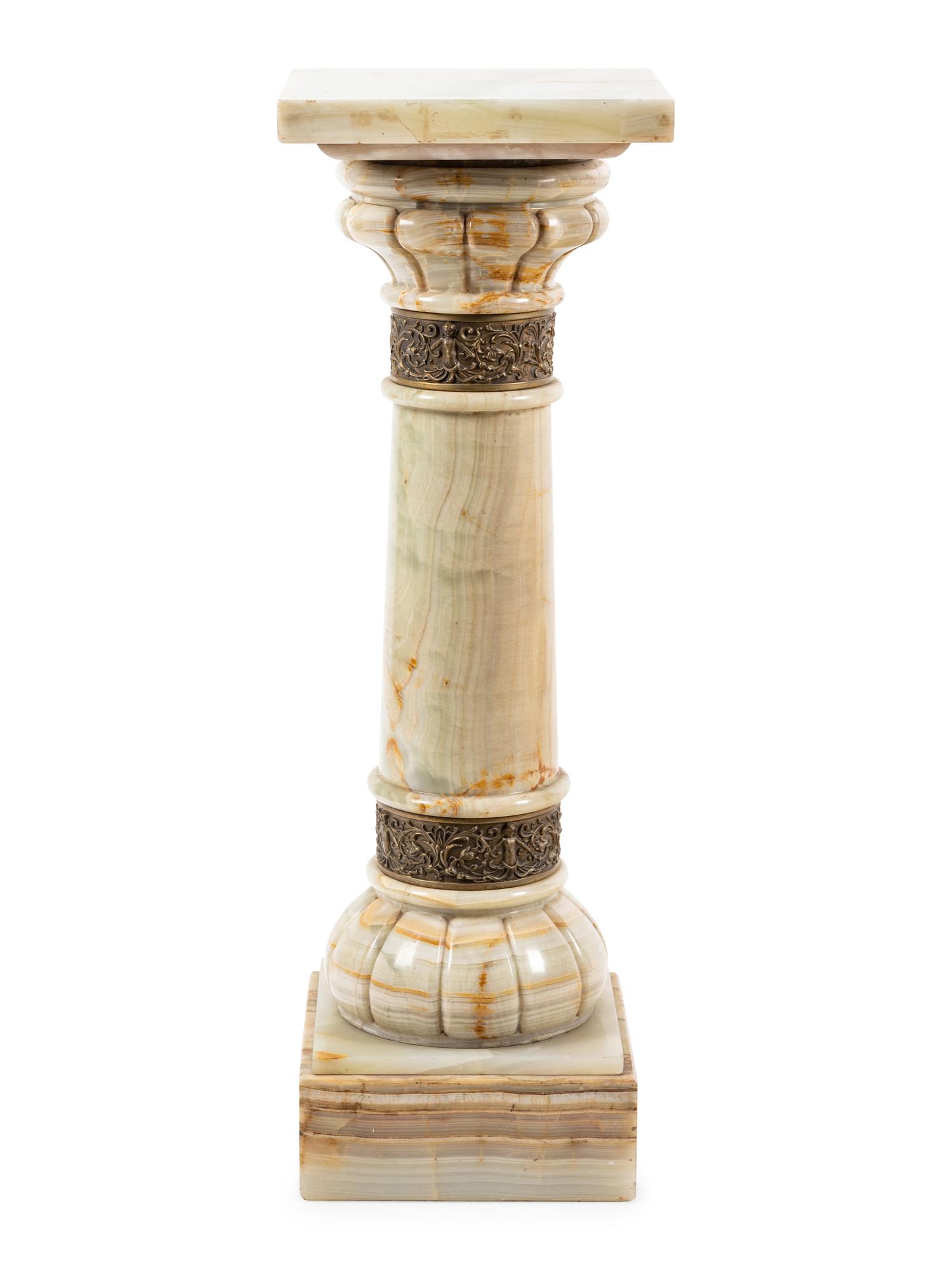 A Continental Gilt Metal Mounted Onyx Pedestal