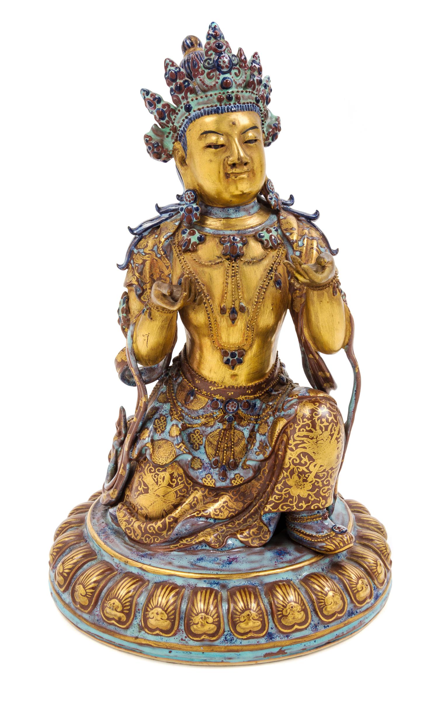 A Gilt Decorated Robin's Egg Glazed Porcelain Figure of Guanyin