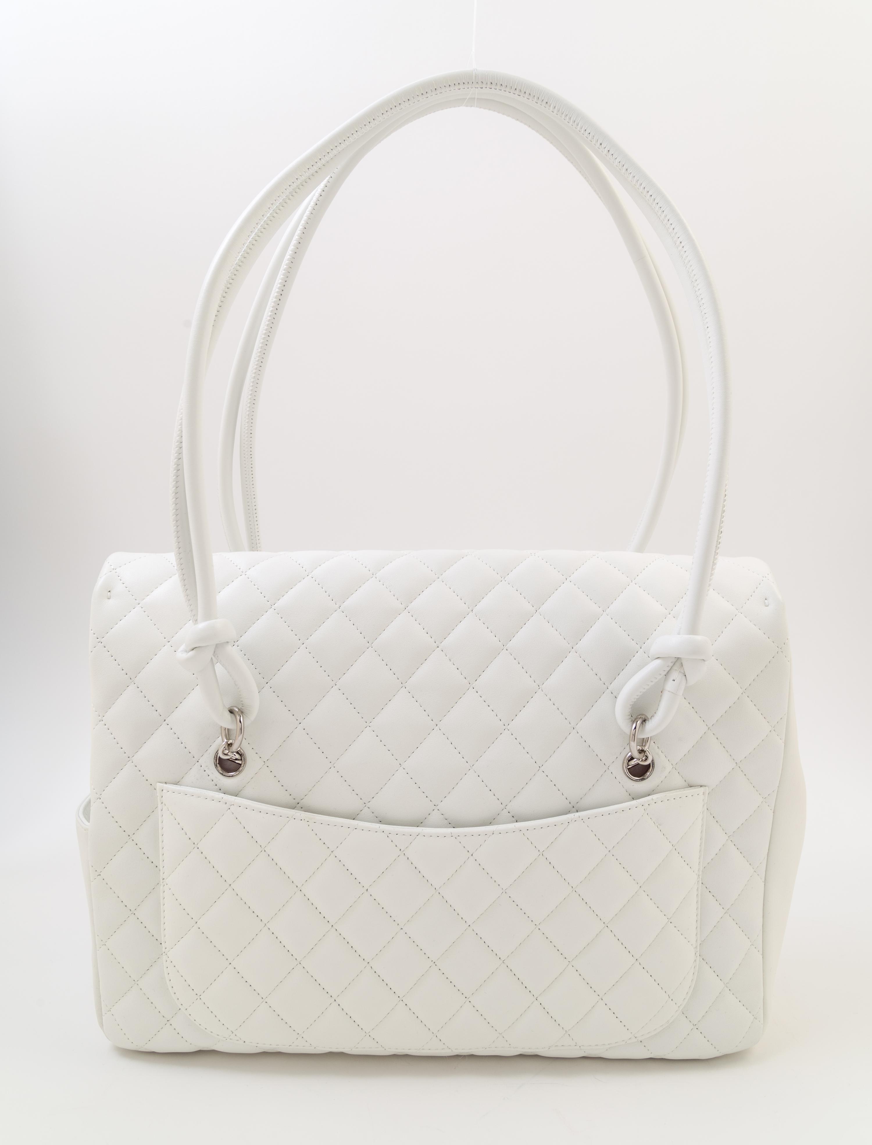 A Chanel White Ligne Cambon Quilted Shoulder Bag, 13/*" x 11" x 4"; Strap drop: 10".