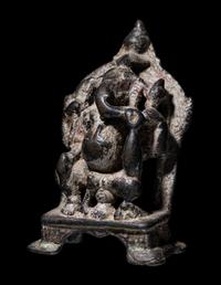 An Indian Bronze Ganesha Enthroned