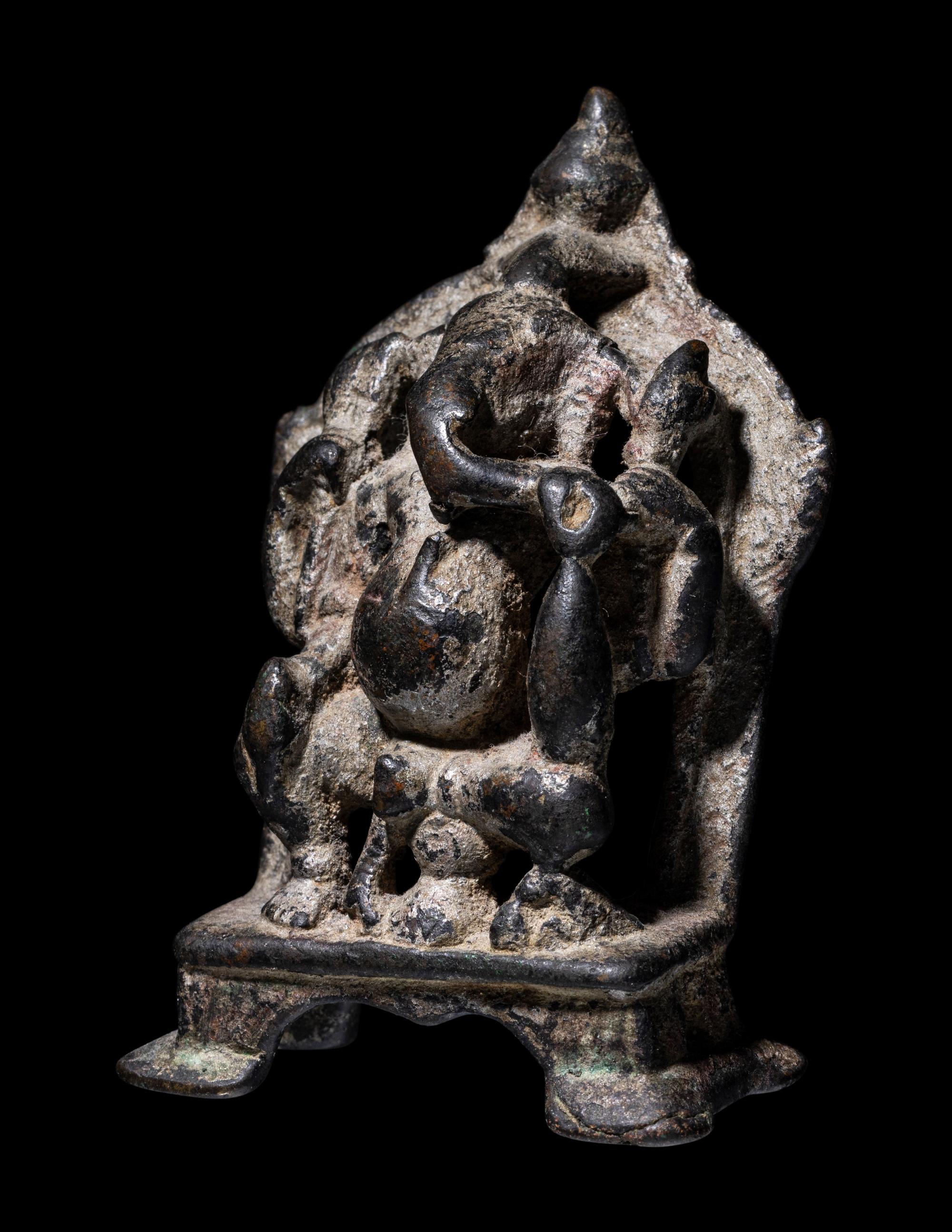 An Indian Bronze Ganesha Enthroned