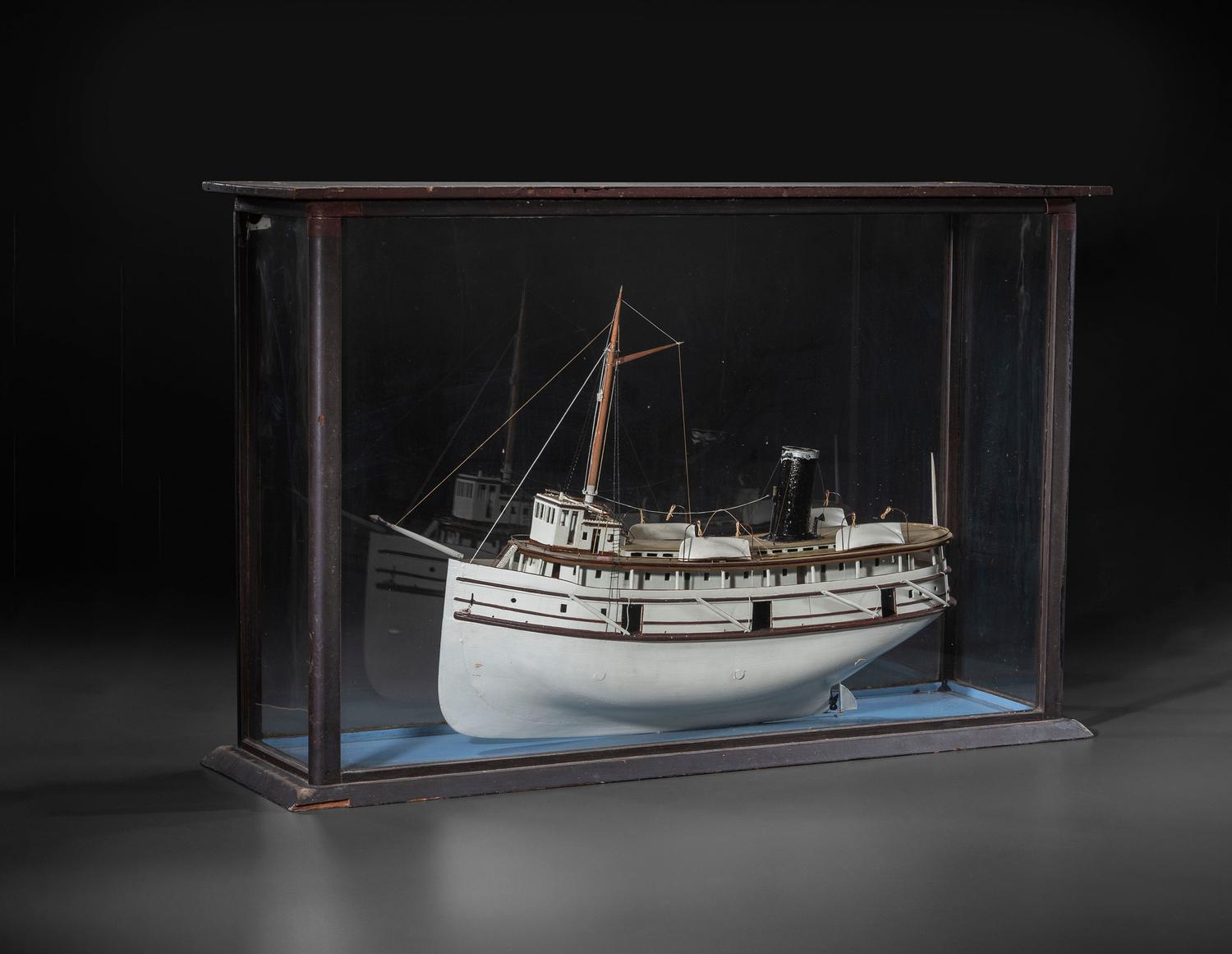 A Painted Wood Cased Steamboat Model