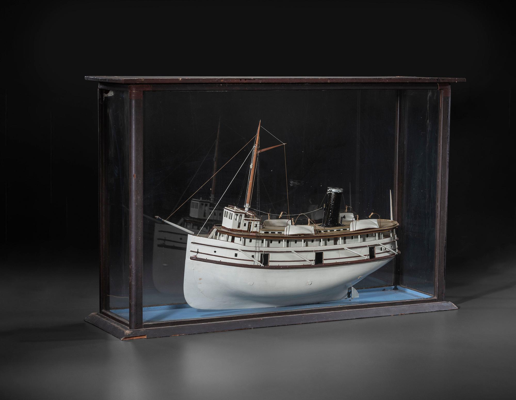 A Painted Wood Cased Steamboat Model