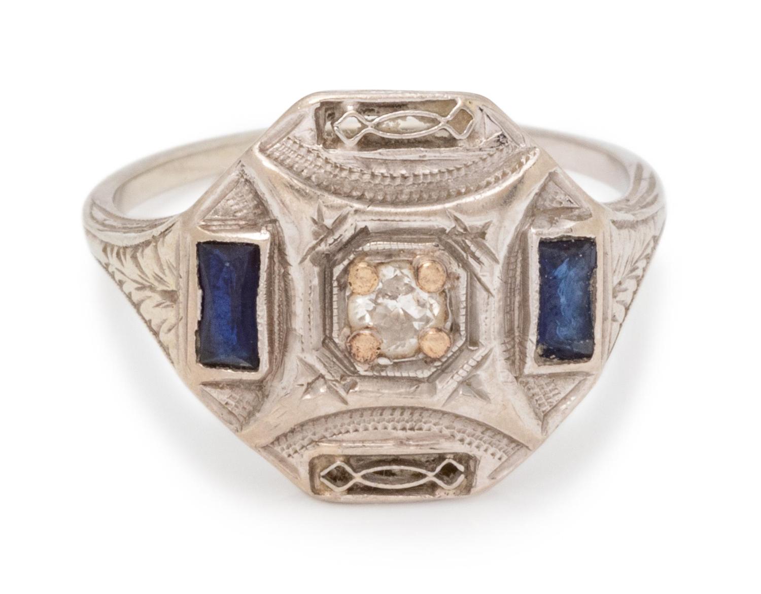 An 18 Karat White Gold, Diamond and Synthetic Sapphire Ring,