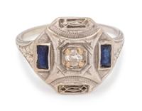 An 18 Karat White Gold, Diamond and Synthetic Sapphire Ring,
