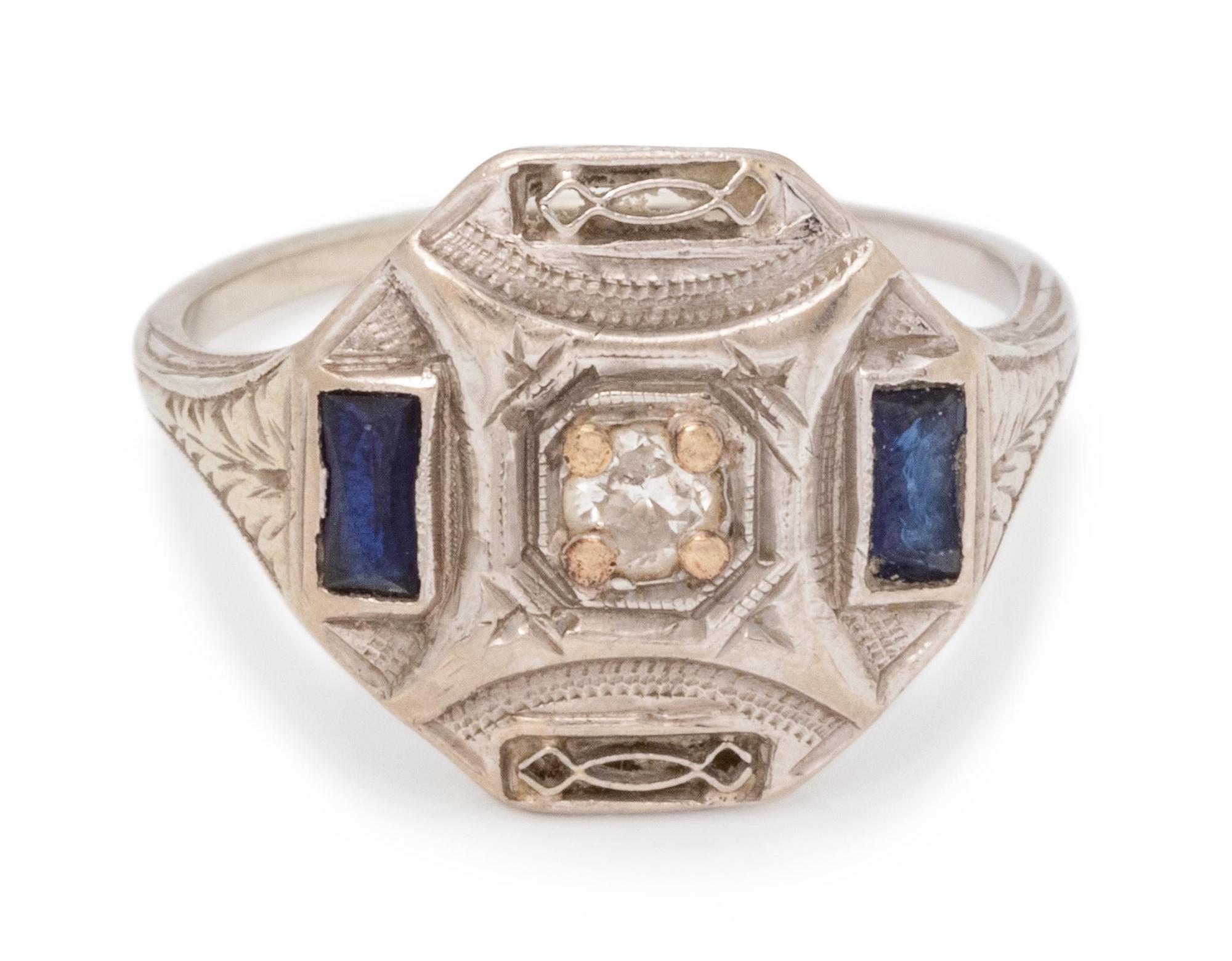 An 18 Karat White Gold, Diamond and Synthetic Sapphire Ring,