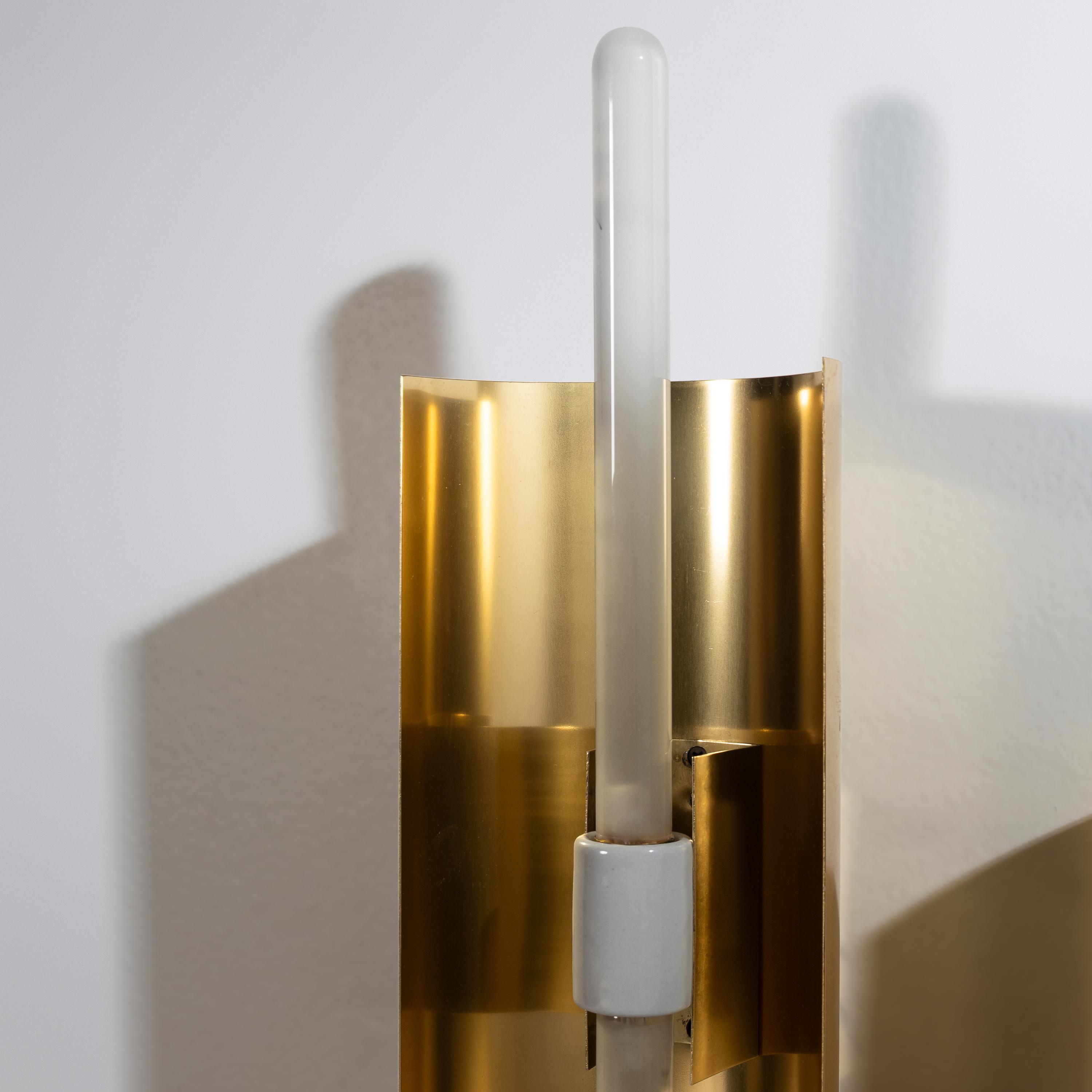 A Pair of Brass and Glass Sconces