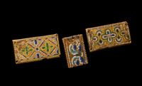 Three Rhenish Champlevé and Gilt Copper Framing Plaques
