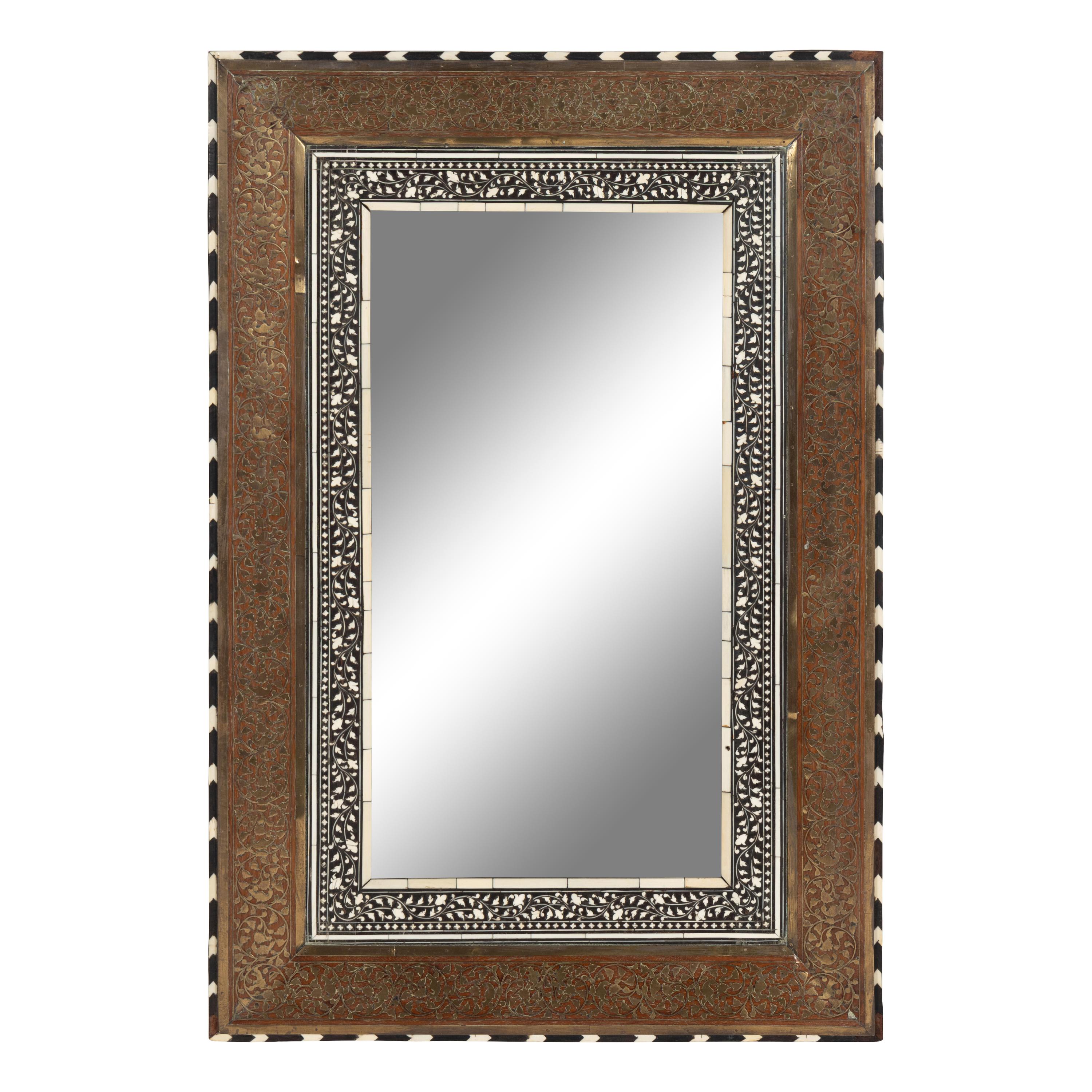 An Anglo-Indian Cut Brass and Bone Inlaid Hardwood Mirror