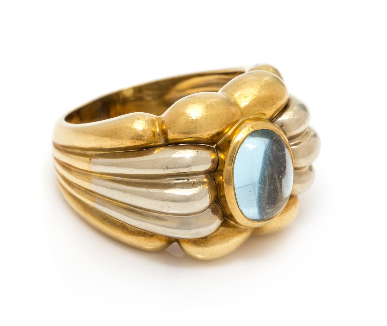 An 18 Karat Bicolor Gold and Aquamarine Ring, Italian, 8.75 dwts.