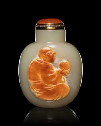 A Carved Russet and Celadon Jade Snuff Bottle