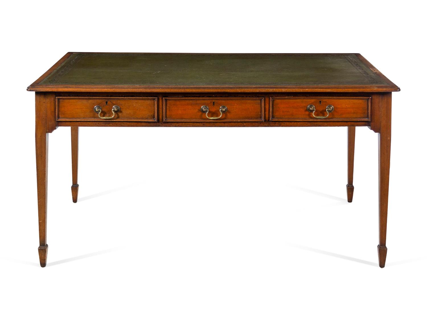 An Edwardian Leather-Inset Mahogany Writing Table