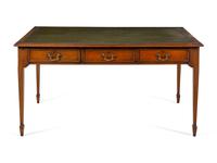 An Edwardian Leather-Inset Mahogany Writing Table