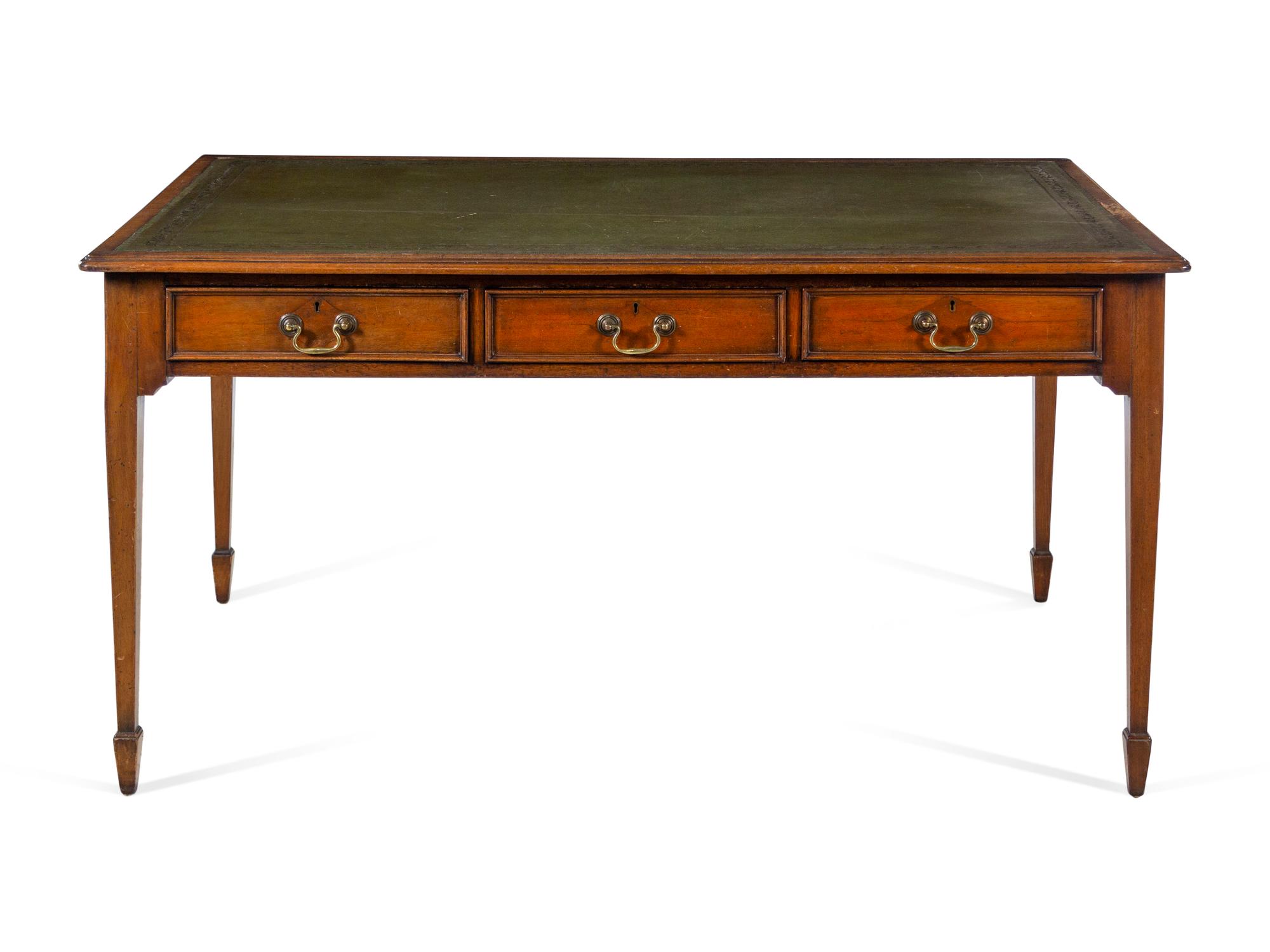 An Edwardian Leather-Inset Mahogany Writing Table