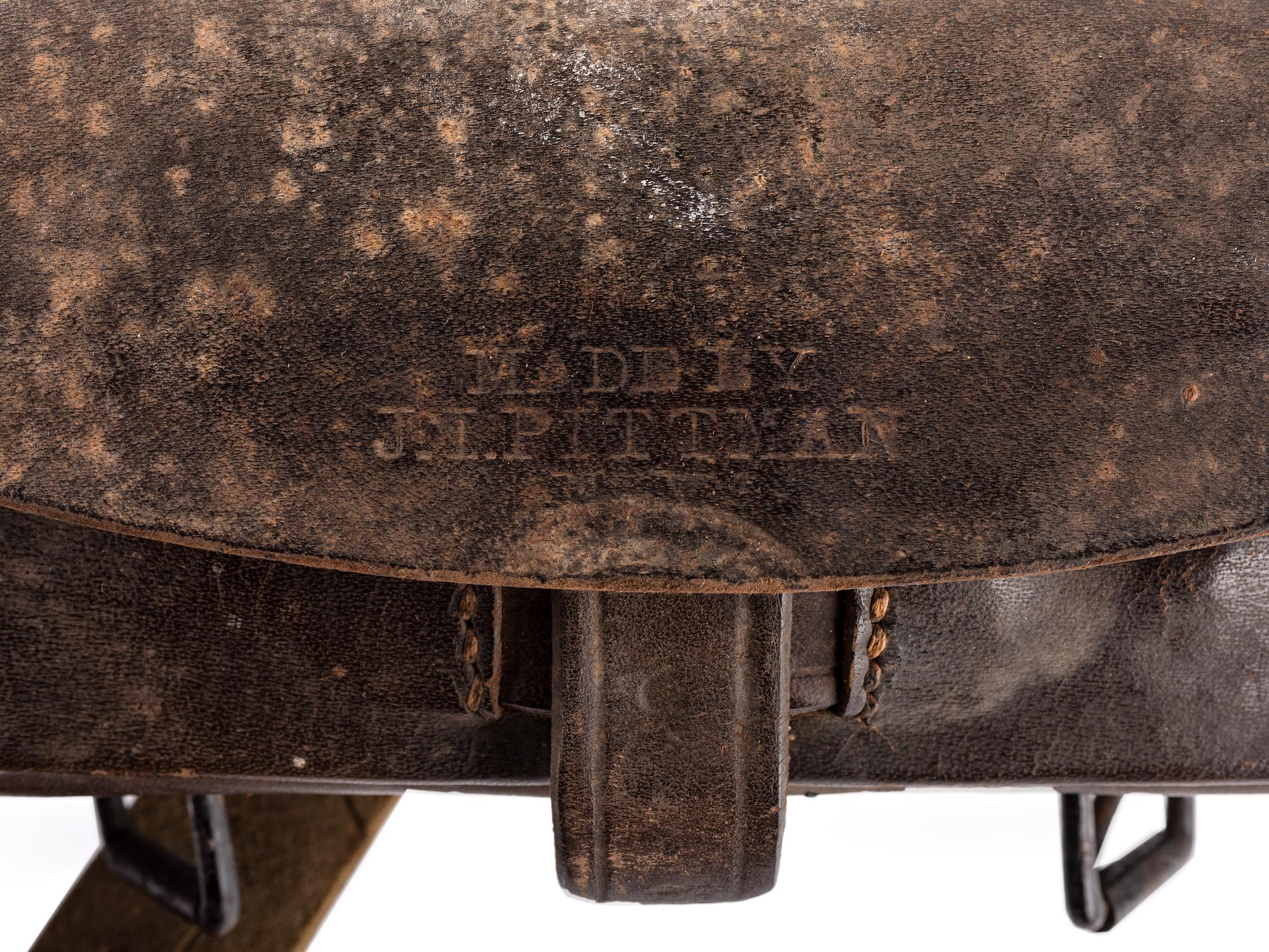 [CIVIL WAR]. Model 1851 cavalry sabre belt by W. Kinsey retaining shoulder strap and equipped with Model 1851 enlisted sword belt plate, maker marked cartridge box, and maker marked cap pouch.