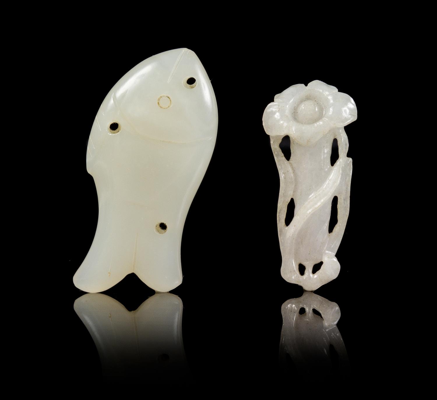 Two Carved Pendants Length of longer 2 inches.