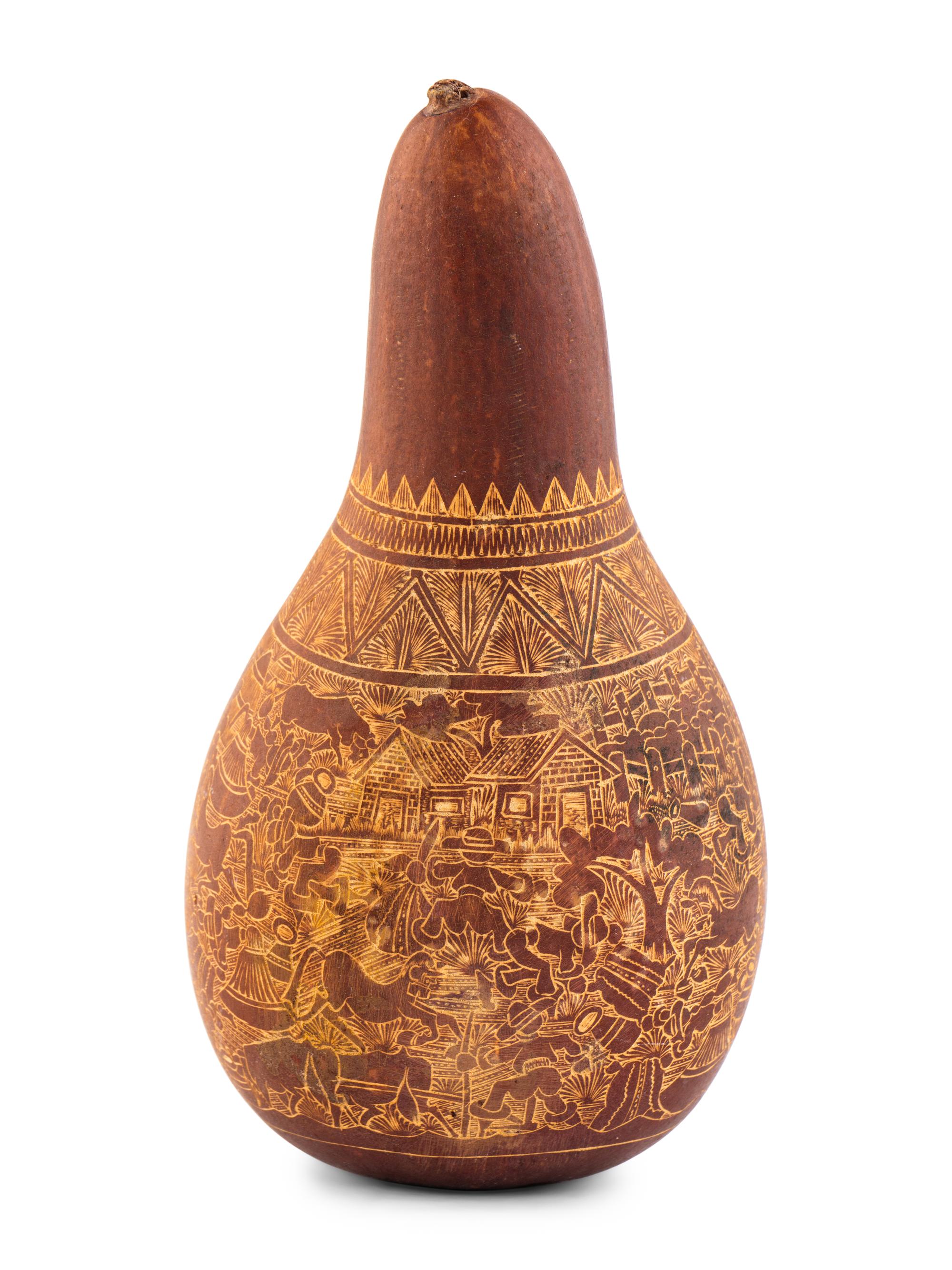 A Carved Gourd Rattle