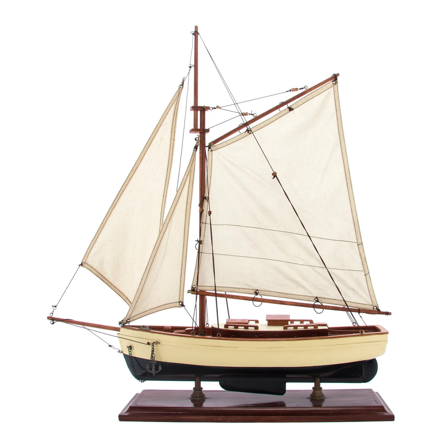 A Painted and Carved Ship Model, Height overall 23 inches.