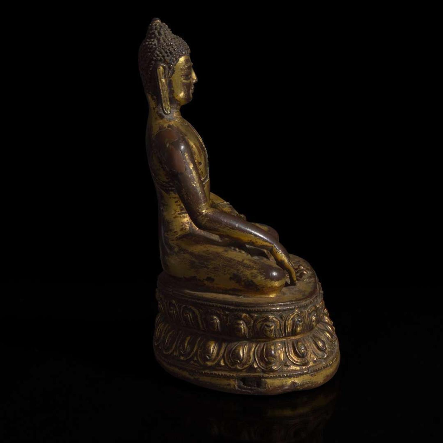 A Himalayan gilt copper alloy figure of Buddha Akshobhya 喜马拉雅铜鎏金阿閦佛造像 14th Century or earlier ???????