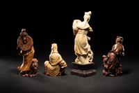 Four Chinese Carved Soapstone Figures of Immortals