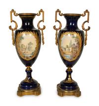 A Pair Gilt Metal Mounted Sèvres Style Porcelain Urns