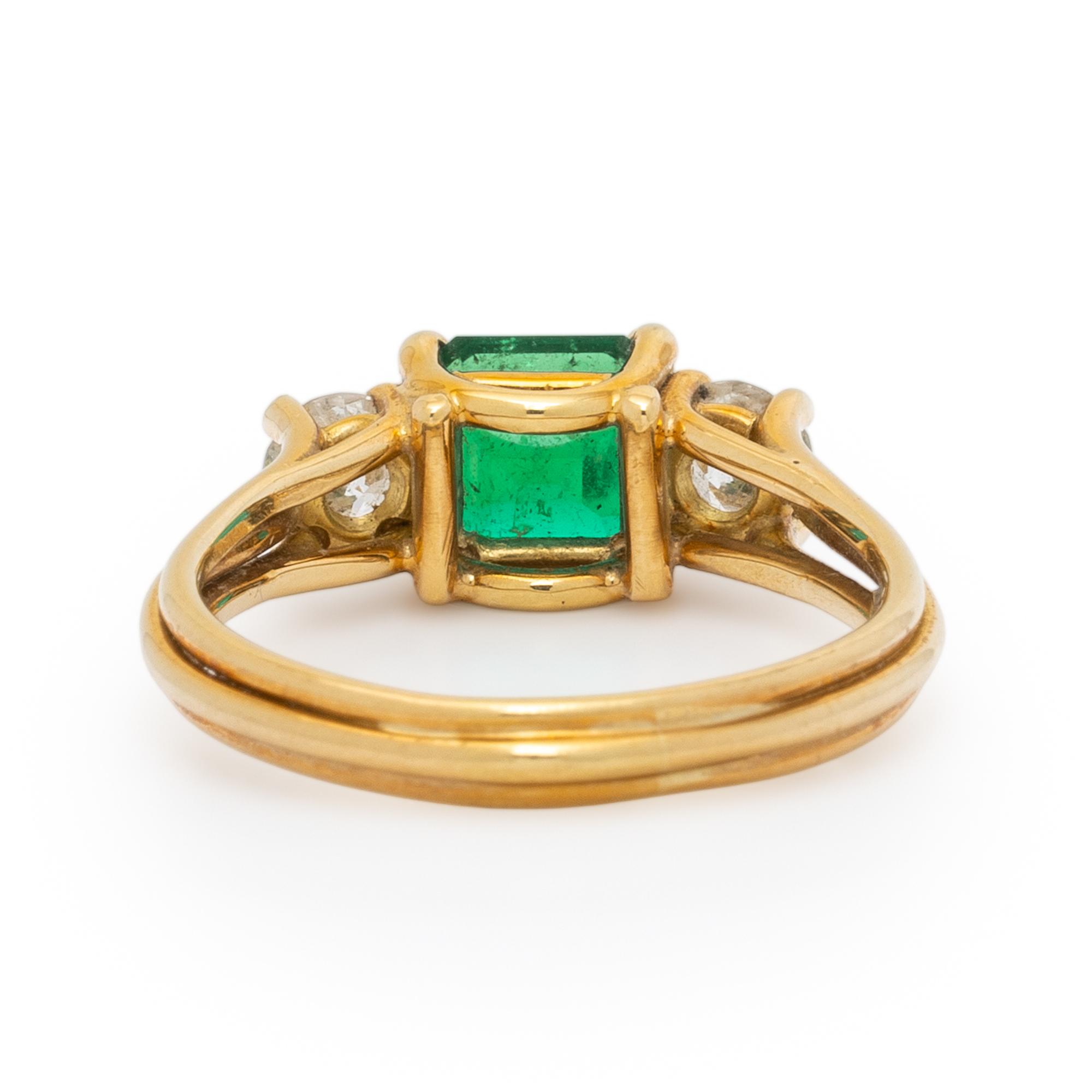 EMERALD, DIAMOND, AND YELLOW GOLD RING