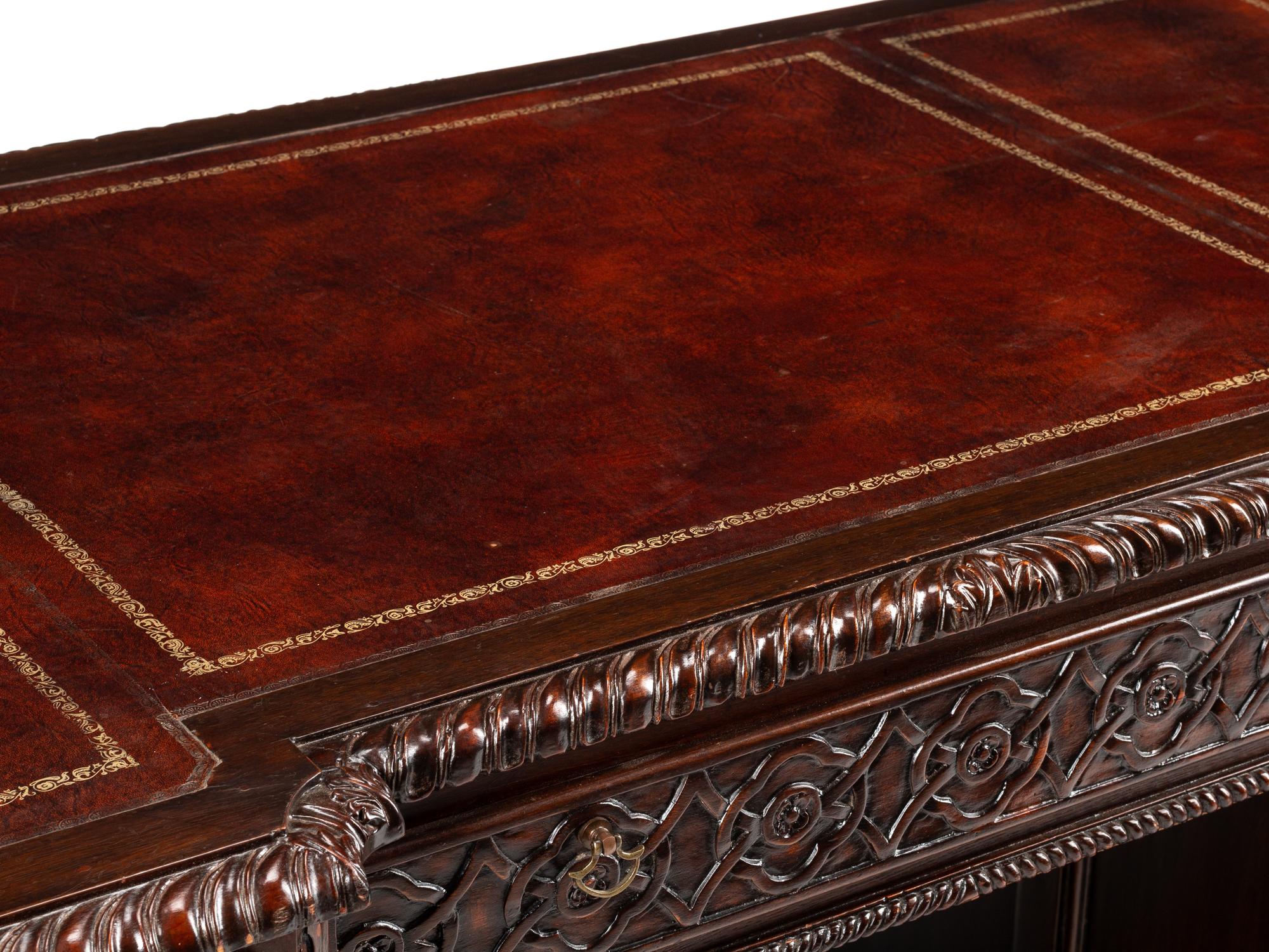 A George III Style Carved Mahogany Pedestal Desk
