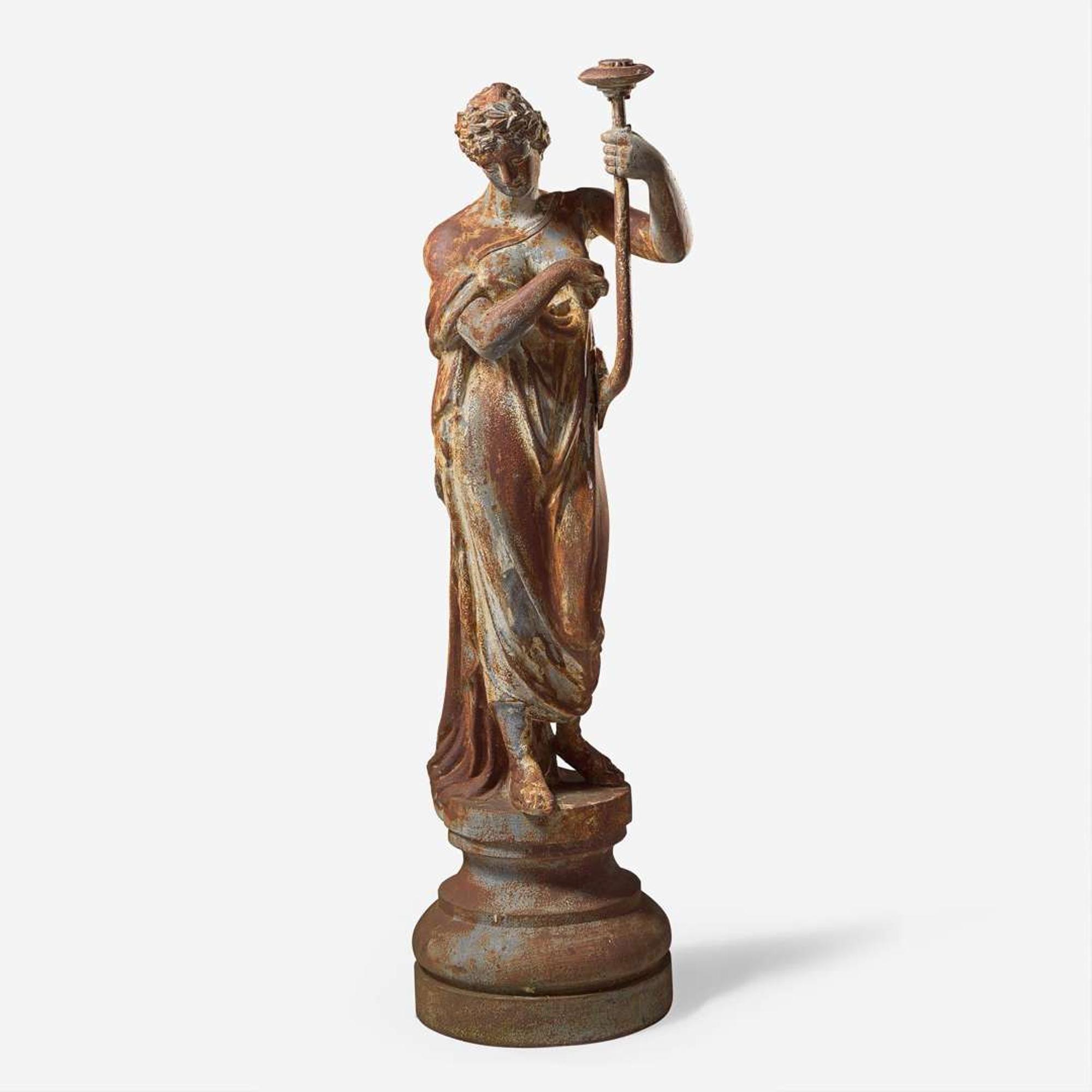 A cast iron garden figure of a Classical lady late 19th century