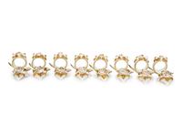 A Large Collection of Napkin Rings, Place Card Holders, and Utensil Rests
