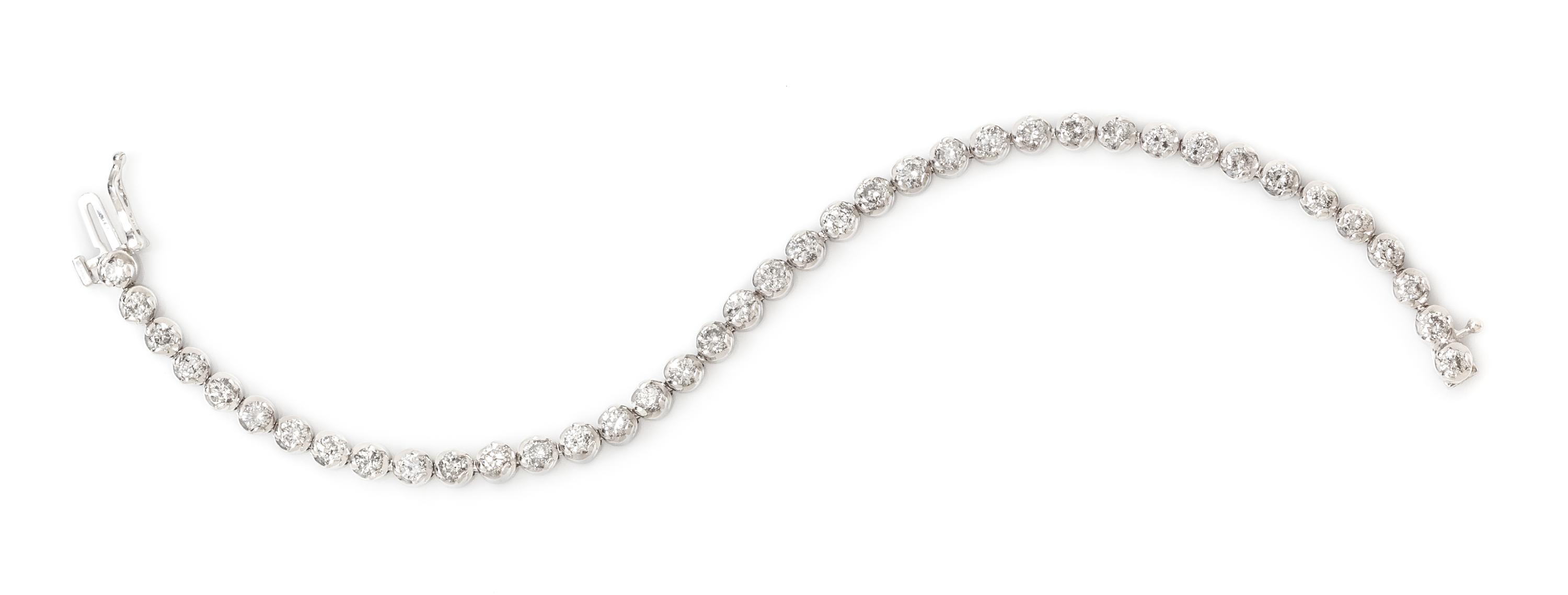 A 14 Karat White Gold and Diamond Line Bracelet, 10.80 dwts.