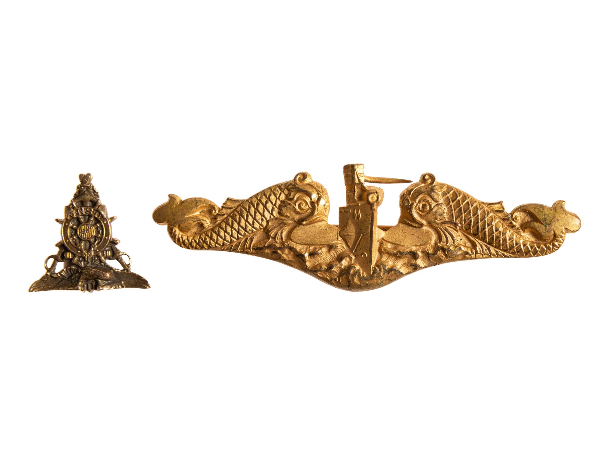 [WORLD WAR II]. US Naval Academy pin for 1923 and submariner's pin belonging to Carl K. Zimmerman, plus 1923 Lucky Bag belonging to J.B. Renn.