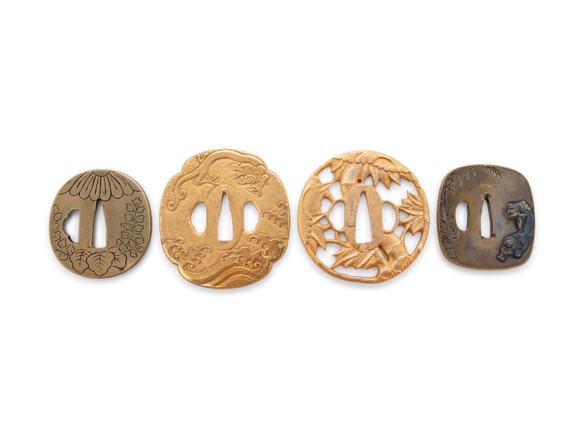 Four Japanese Metal Tsuba