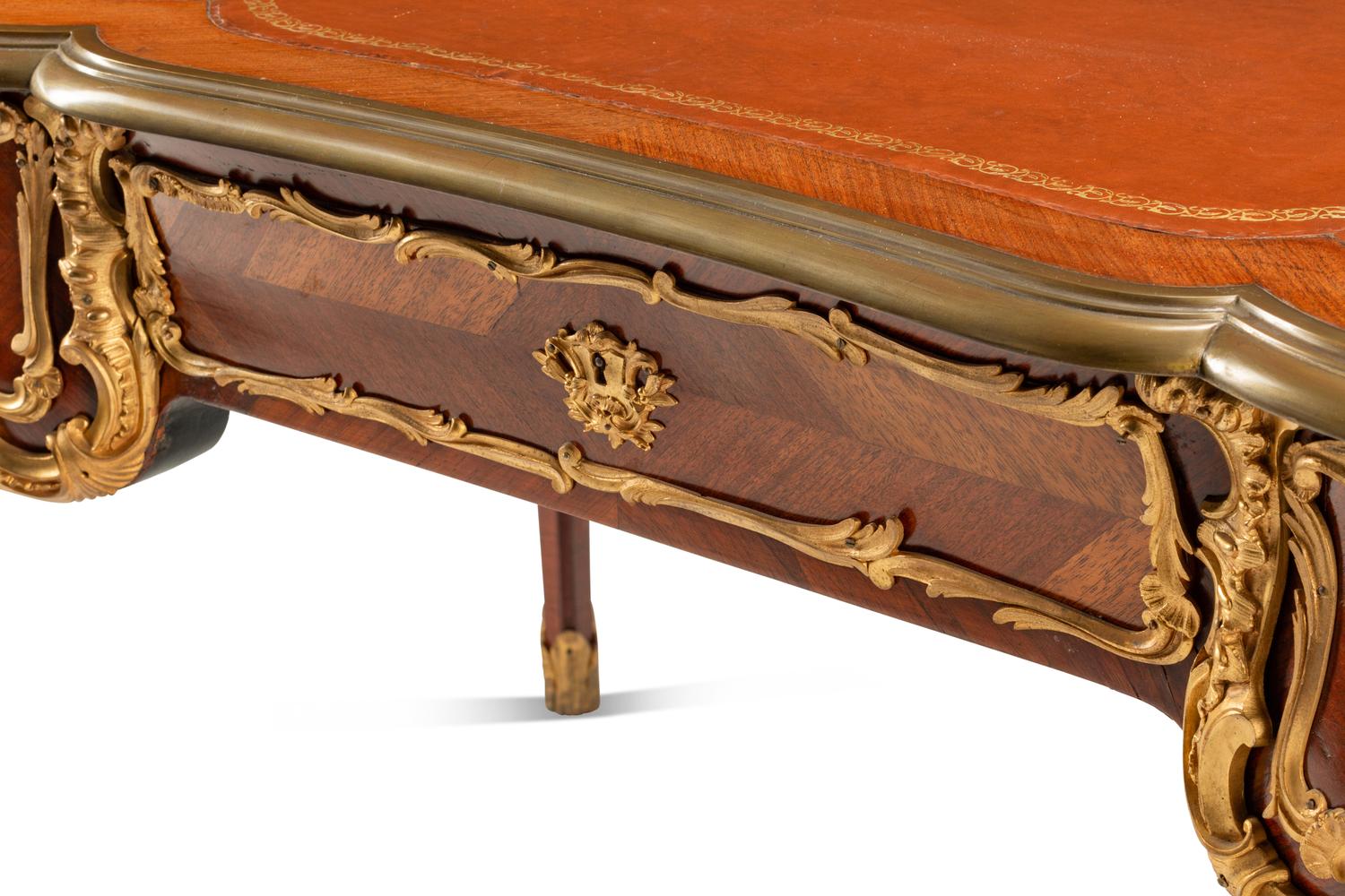 A Louis XV Style Gilt Bronze Mounted Kingwood Bureau Plat