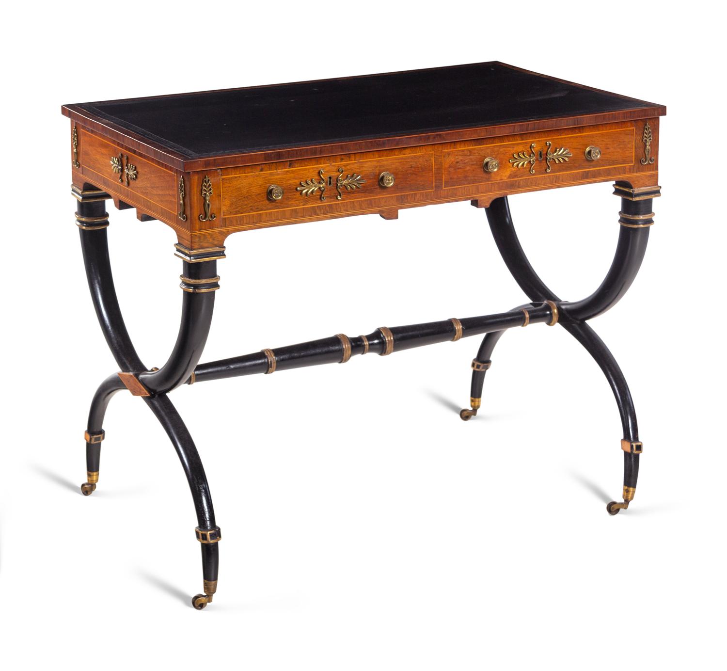 A Regency Gilt Bronze Mounted, Parcel Ebonized and Parcel Gilt Rosewood Writing Table
