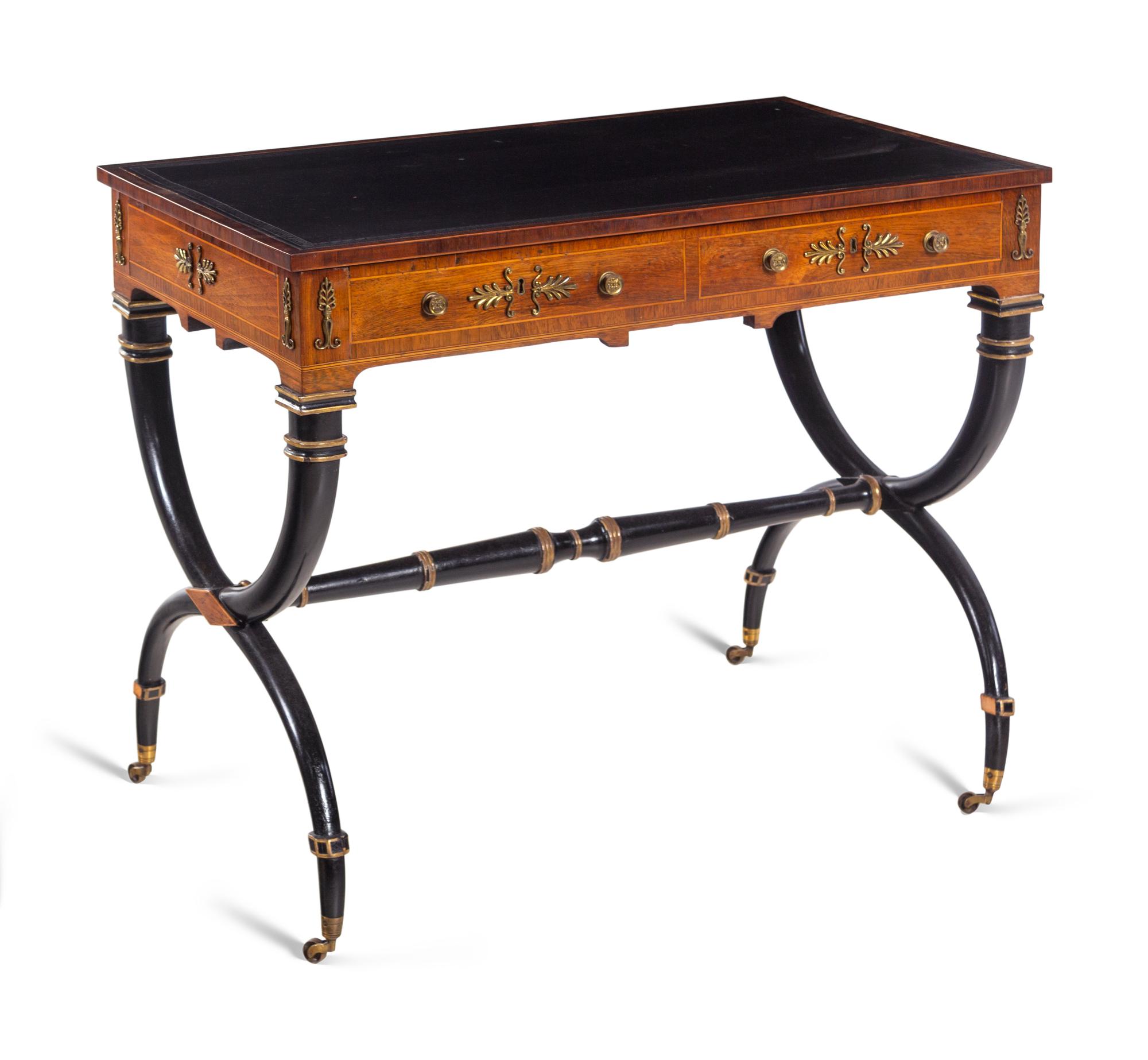 A Regency Gilt Bronze Mounted, Parcel Ebonized and Parcel Gilt Rosewood Writing Table