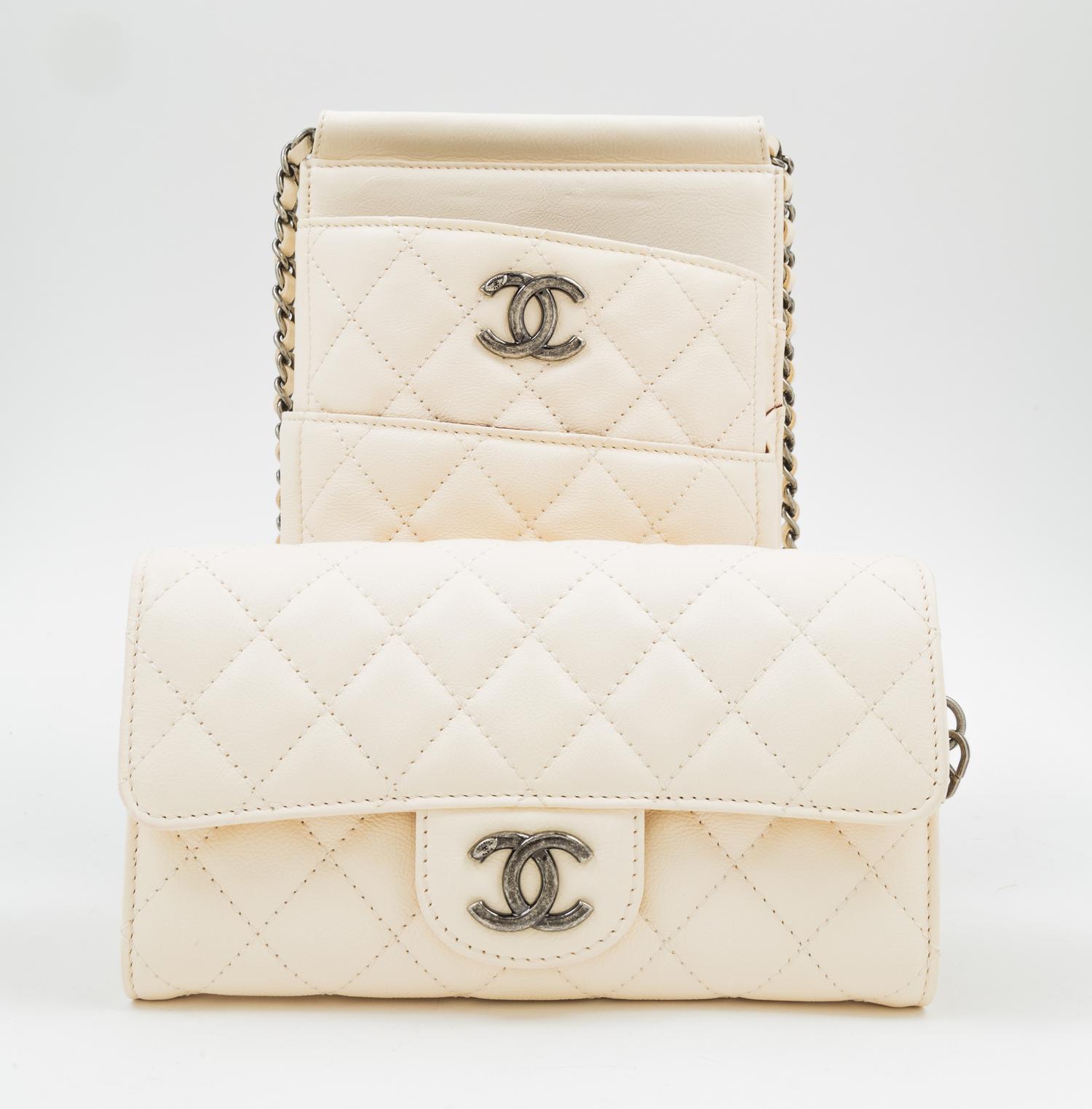 A Chanel Cream Leather Cross Body Pouch with Wallet, Bag: 5.5" x 10" x 1.5"; Wallet: 7.5" x 4.5" x 1.5".