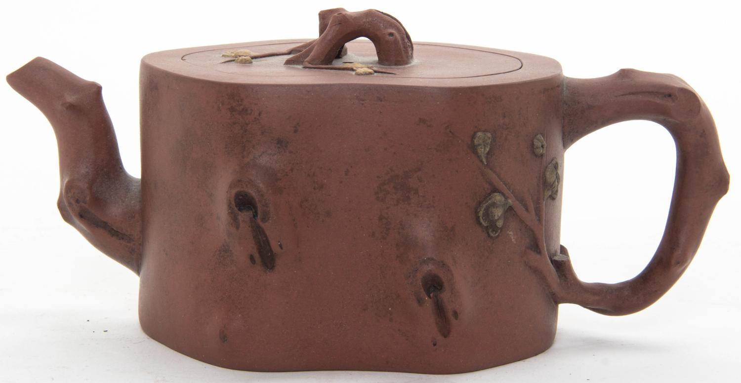 A Yixing Pottery Teapot Width at widest 7 5/8 inches.