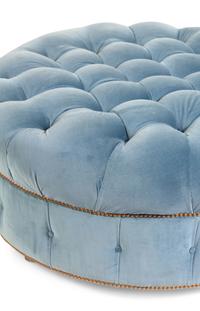 A Velvet-Upholstered Button-Tufted Ottoman
