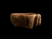 A Mesopotamian Red Marble Bowl in the Form of a Ram