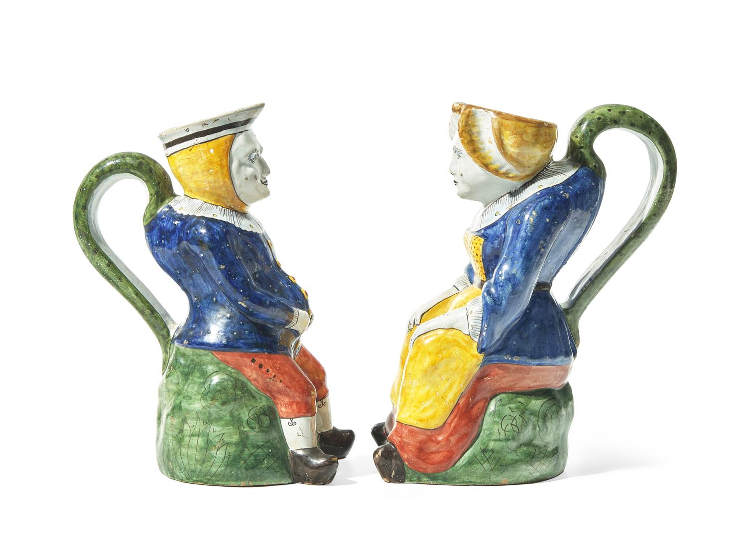 A Pair of Dutch Delft Polychrome Toby Jugs