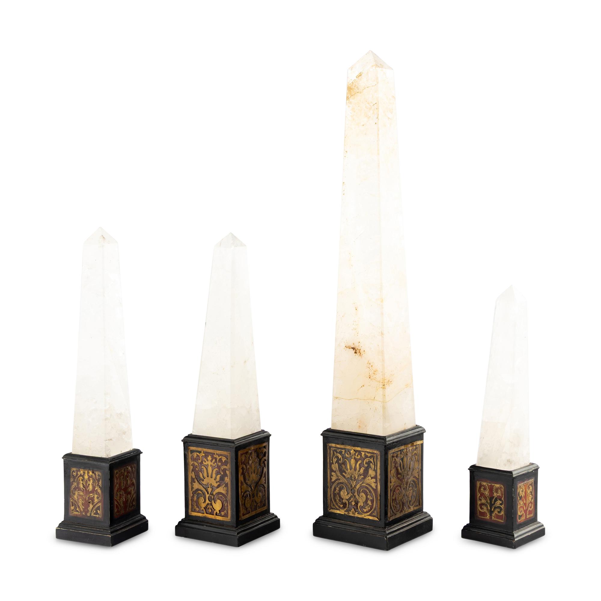 A Set of Four Graduated Rock Crystal Obelisks with Boulle Marquetry Bases