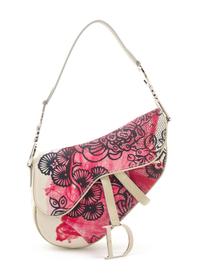 A Christian Dior Cream Denim Saddle Handbag, 10" x 8" x 2.25".