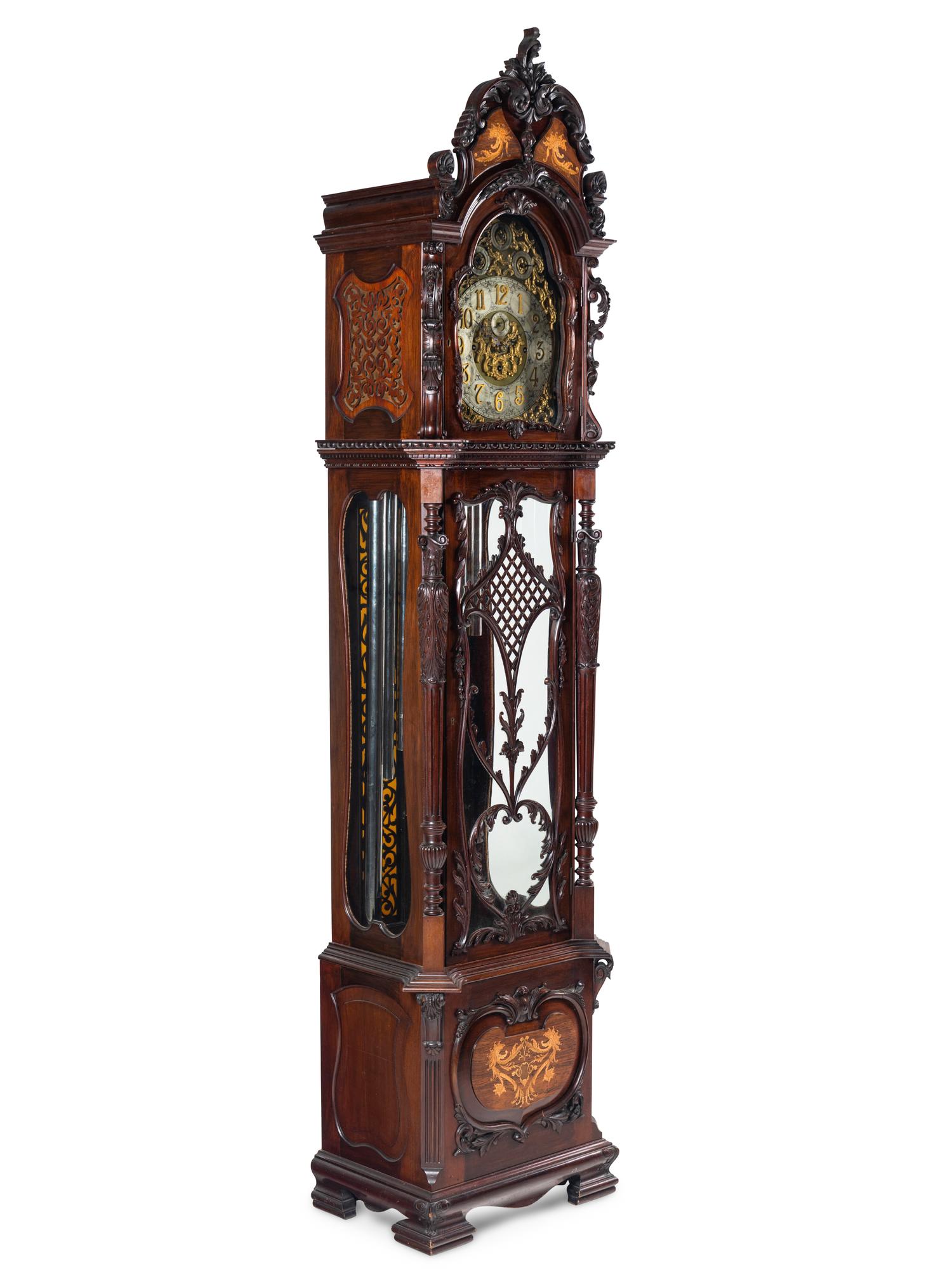A Victorian Carved Mahogany and Marquetry Nine-Tube Tall Case Clock