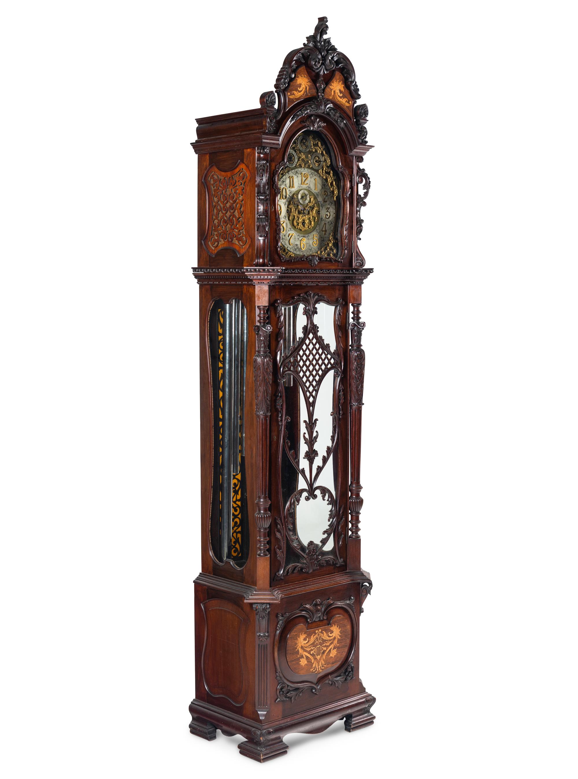 A Victorian Carved Mahogany and Marquetry Nine-Tube Tall Case Clock