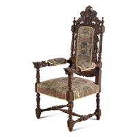 A Renaissance Revival Carved Oak Armchair